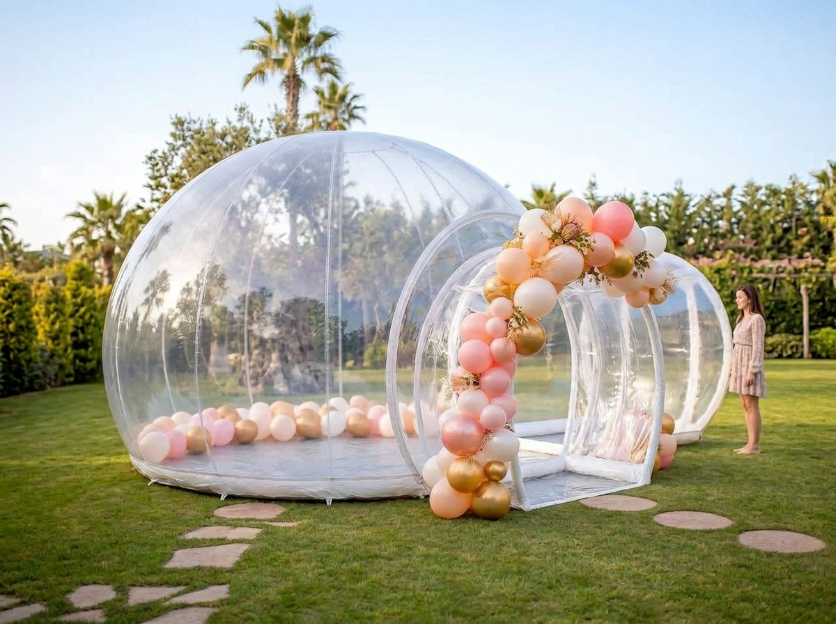 Side view showing the compact Bubble House dome and clear tunnel entrance